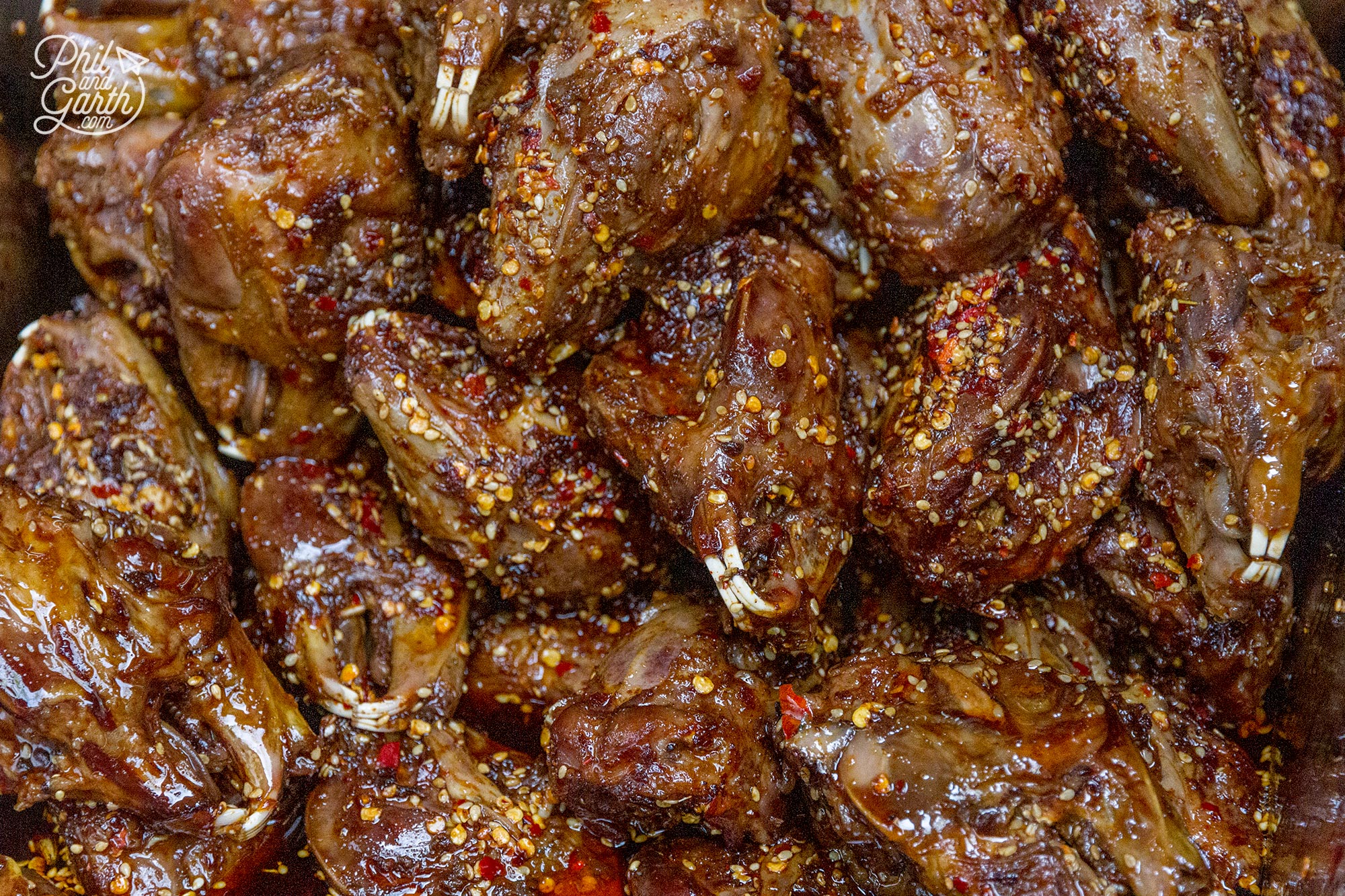 Spicy rabbit heads for sale on wide and narrow alley