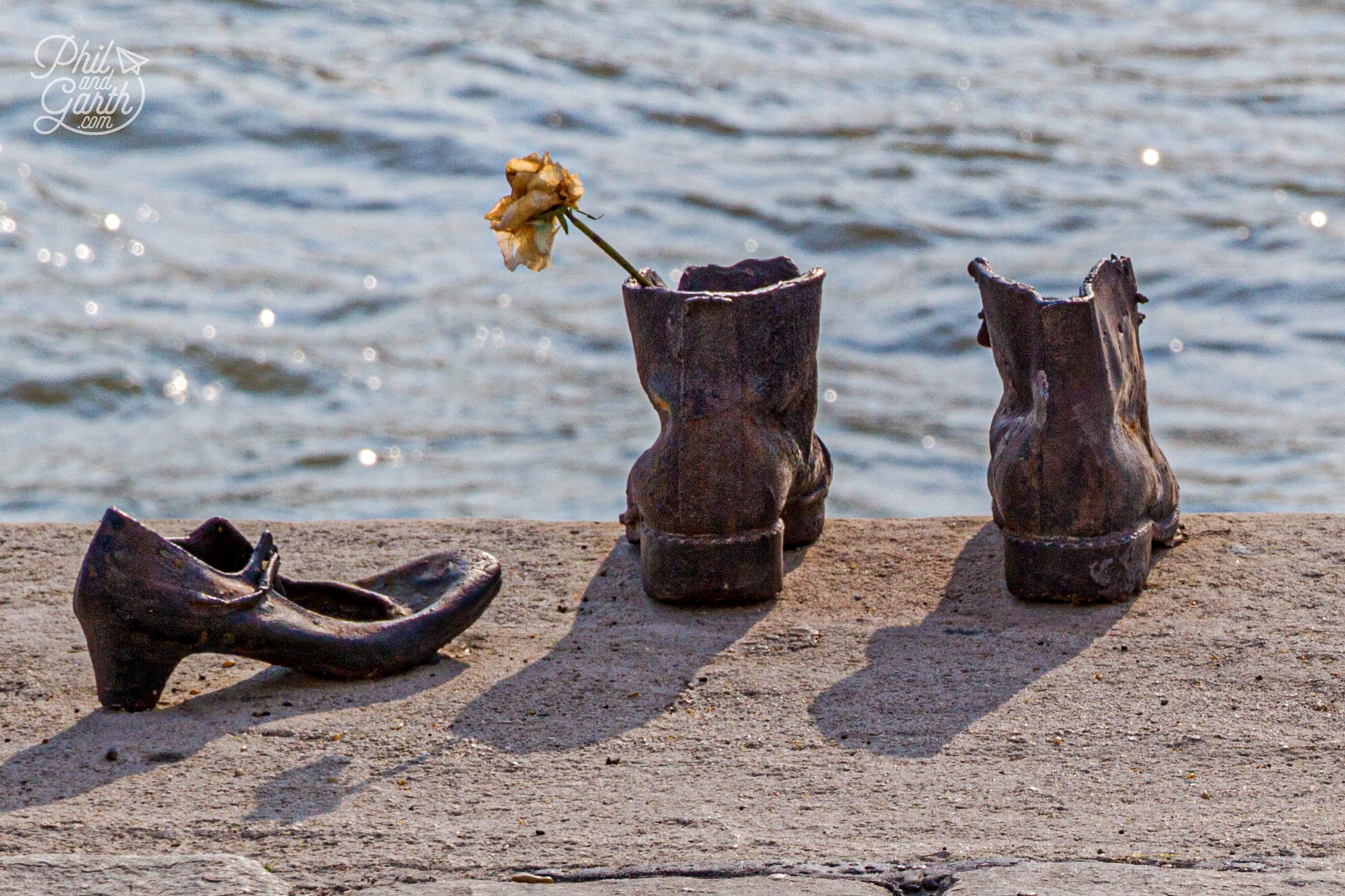 The memorial includes some tiny shoes of a child