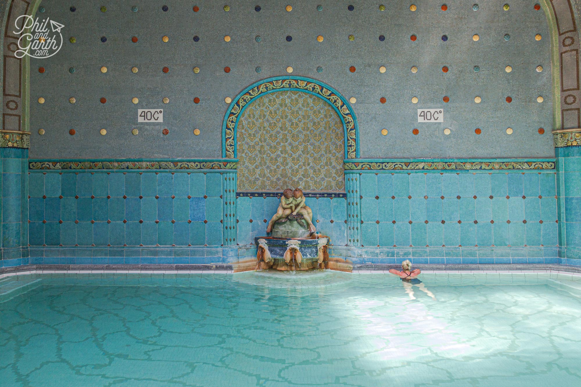 The opulent interior of the hot thermal pool