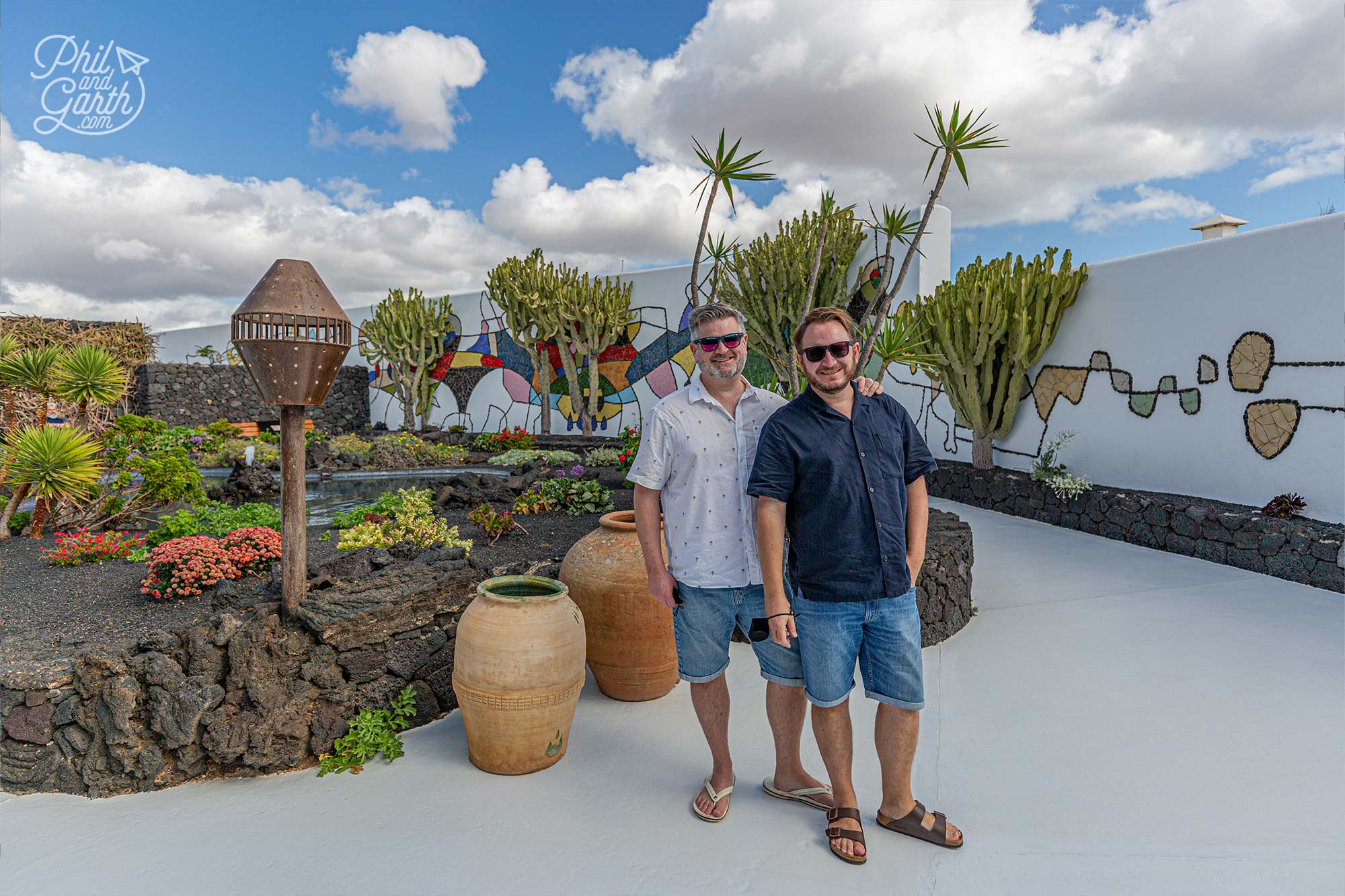 Manrique's formal garden with colourful plants to compliment the colourful mural