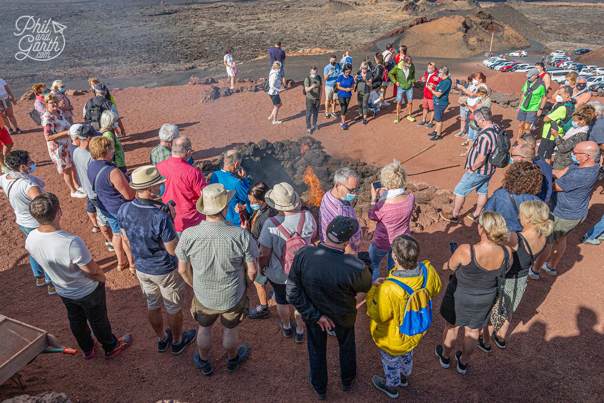 Tourists watch the impressive geothermal demonstrations