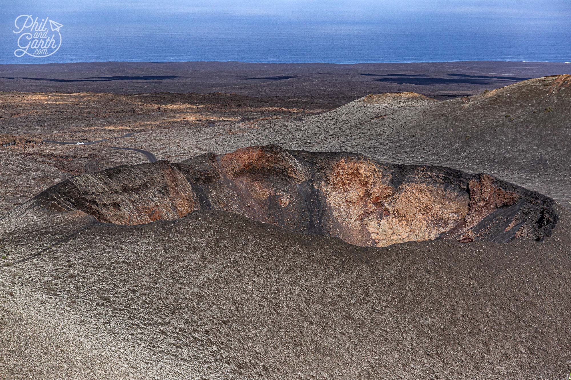 dormant volcanoes dot the eerie landscape of Timanfaya National Park