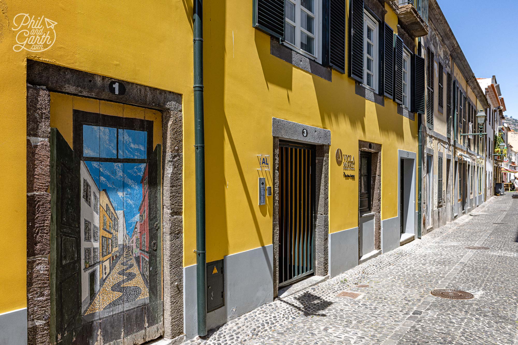 200 painted doors line the streets of Rua Santa Maria