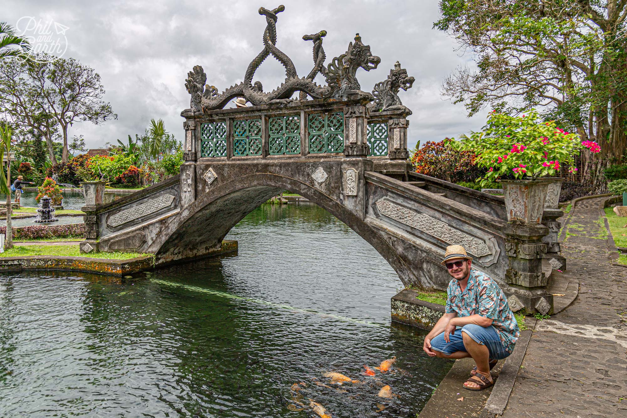 Garth feeding some of the koi carp fish