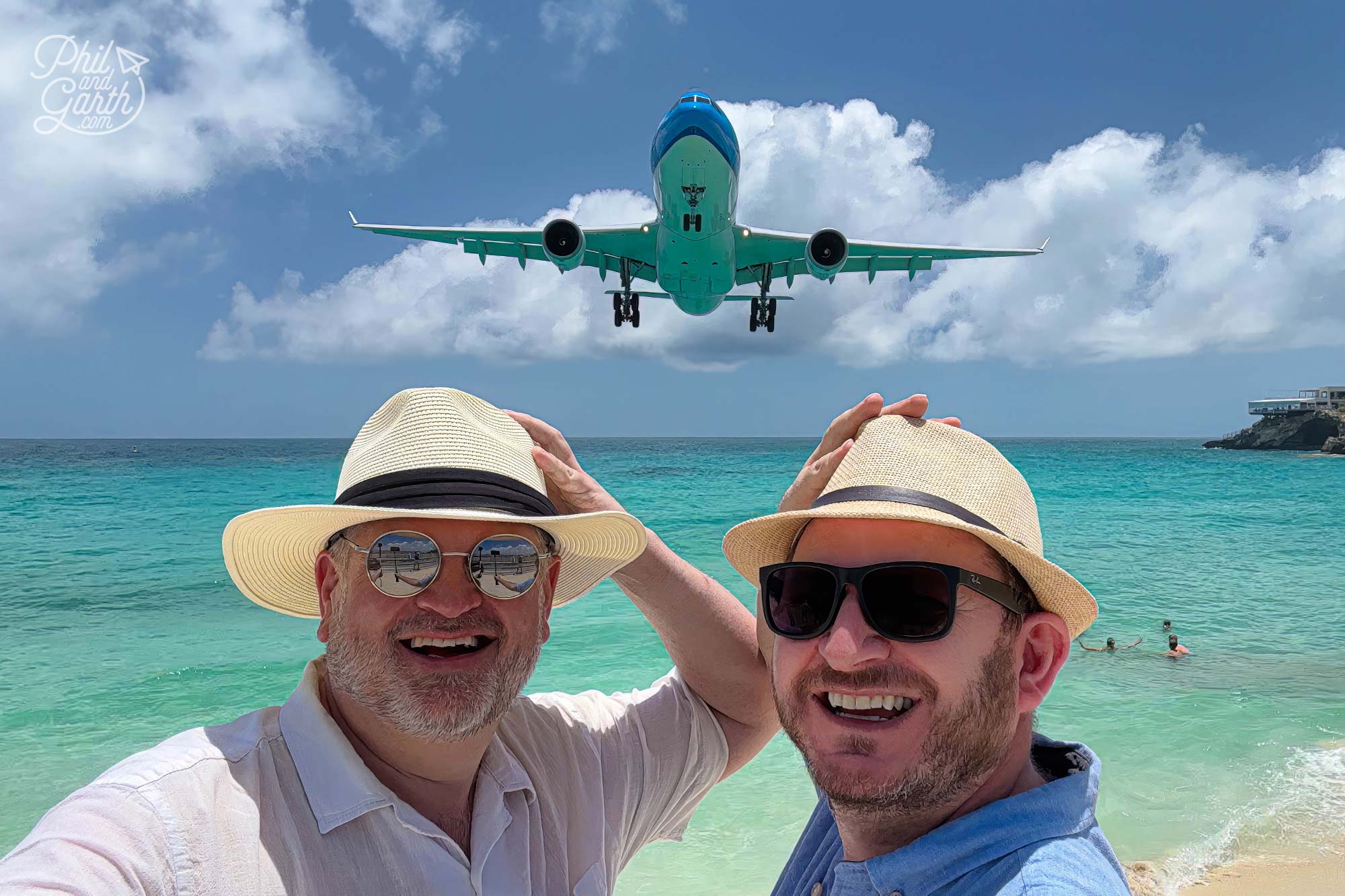 Phil and Garth on Maho Beach as a KLM plane comes into land