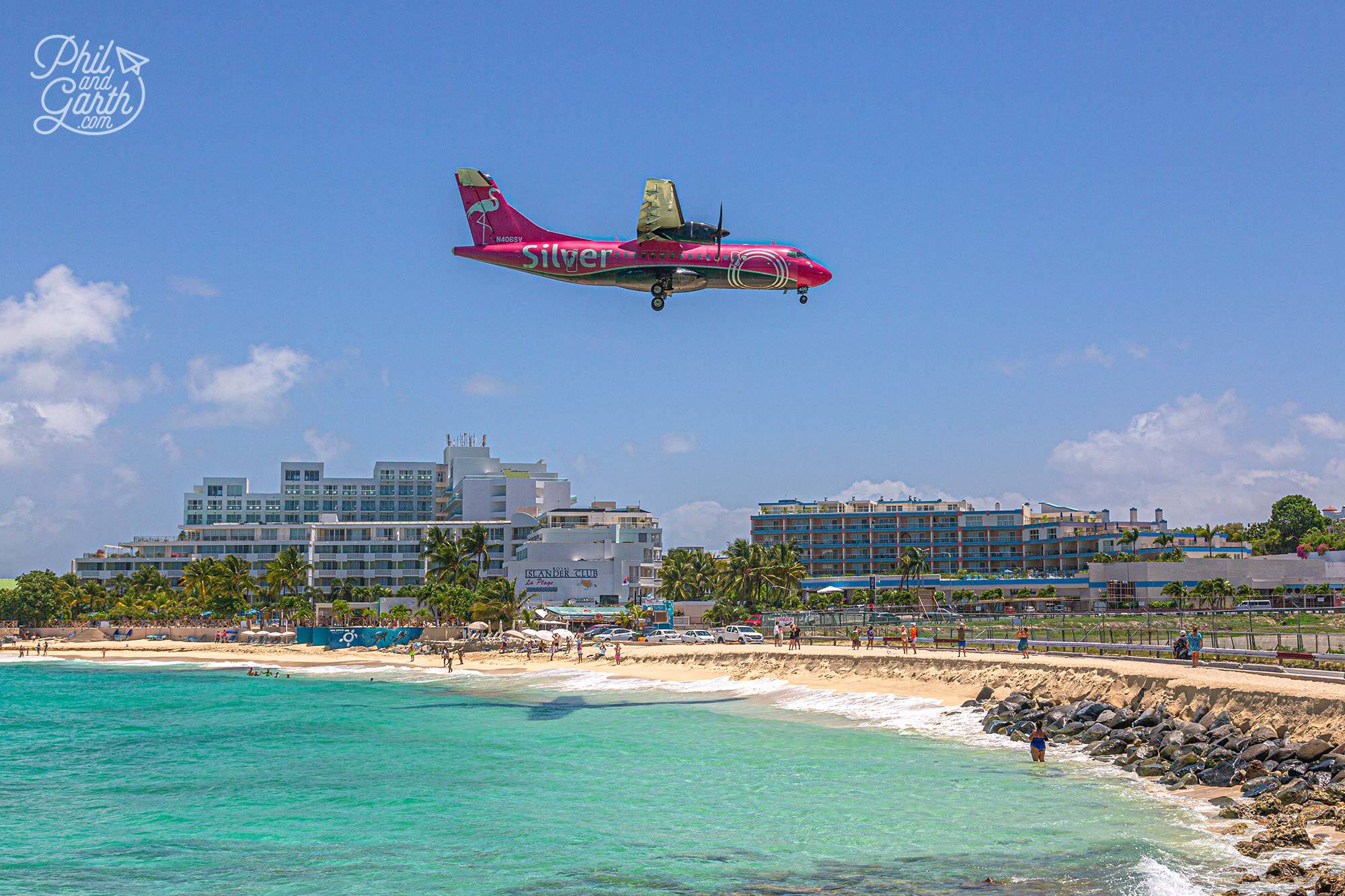 The view of planes landing from The Sunset Beach Bar