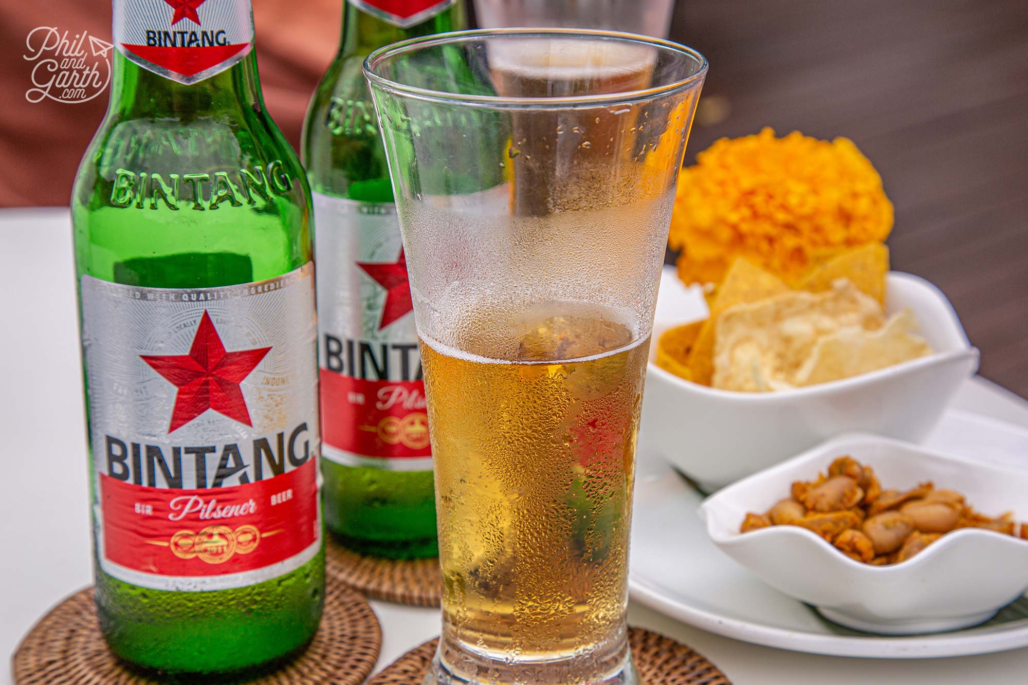 Enjoying ice cold Bintang beers next to the pool