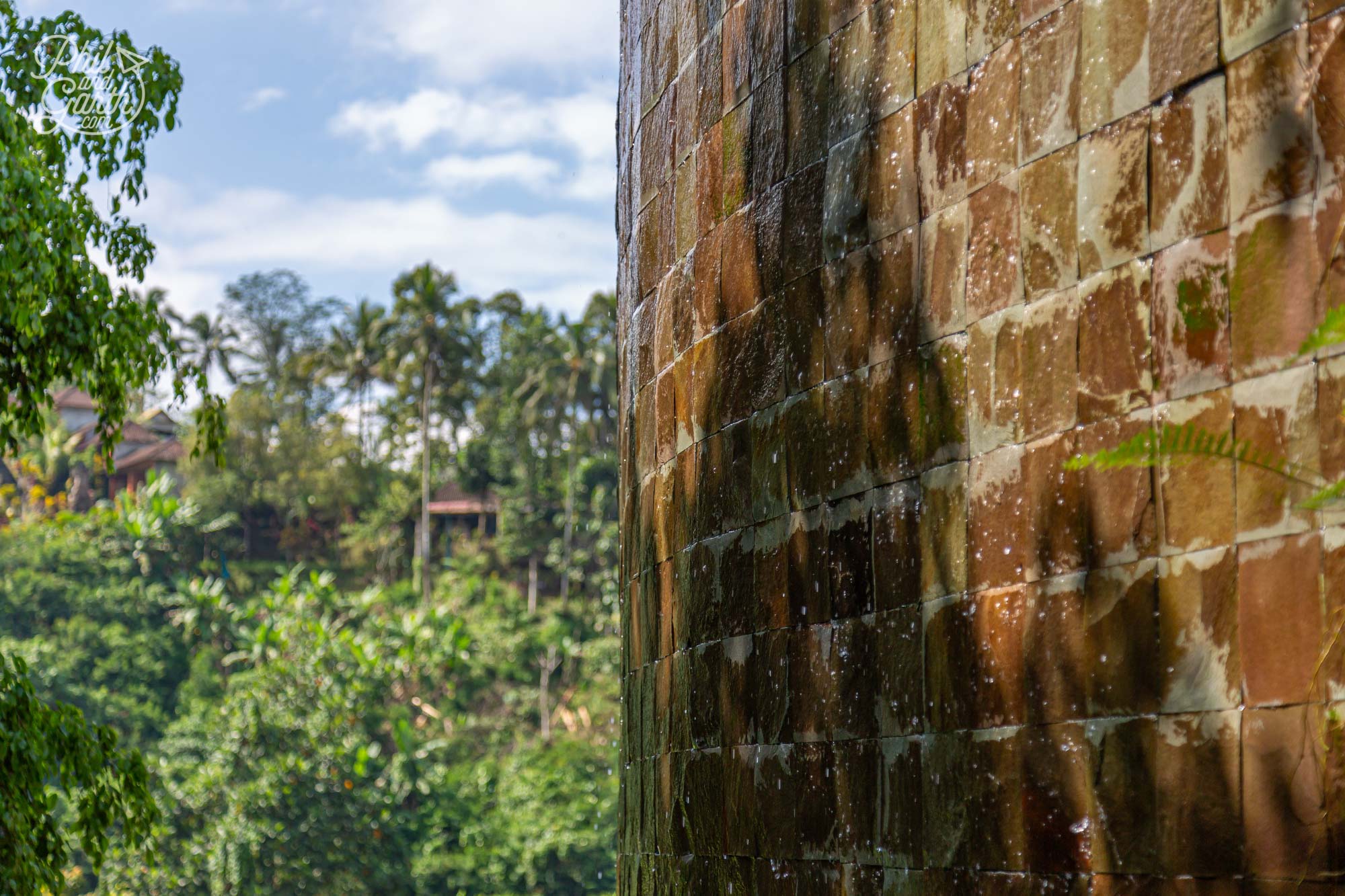 Water cascades down from the upper floor to the lower floor