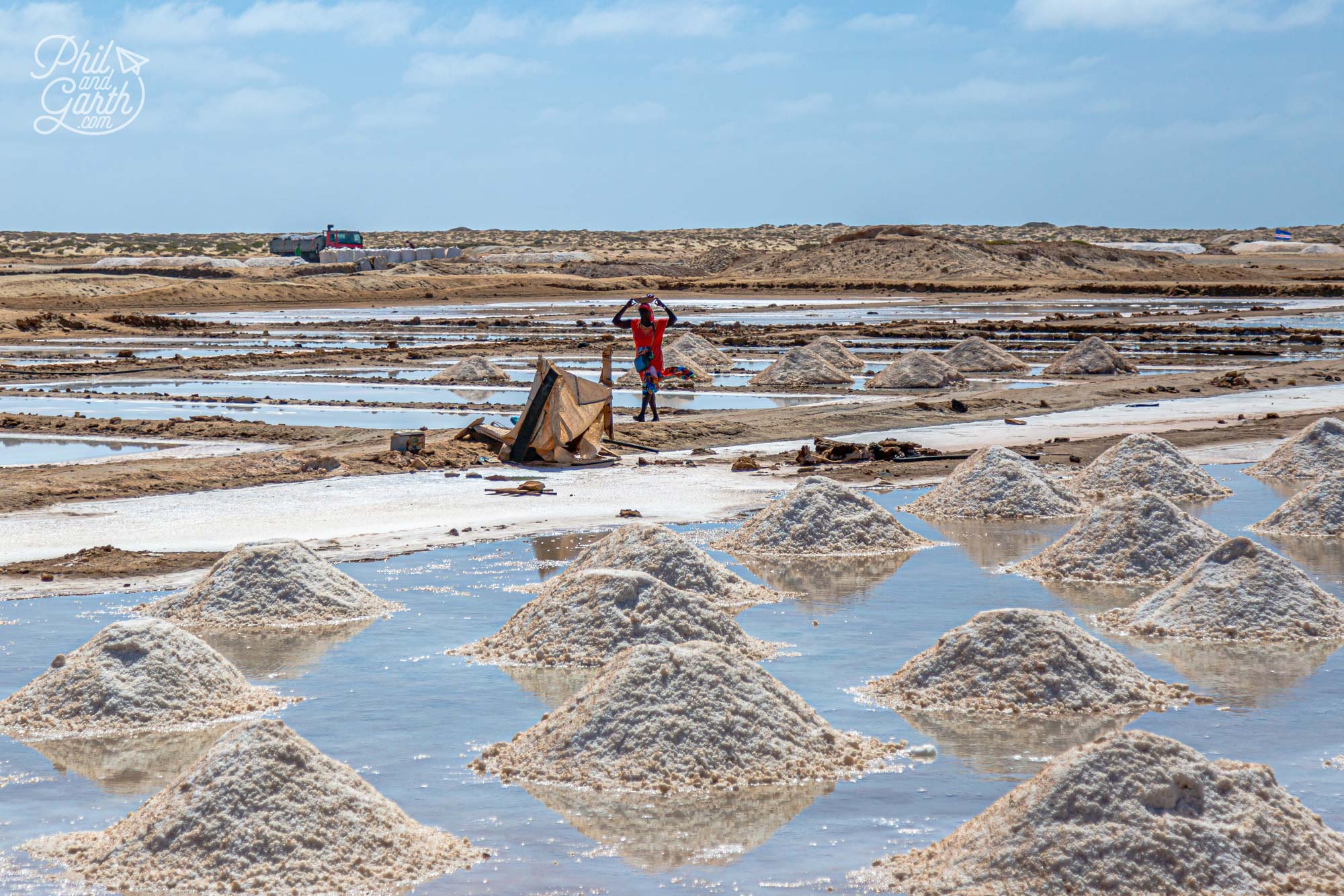 A lady walking through the Santa Maria Salt Flats