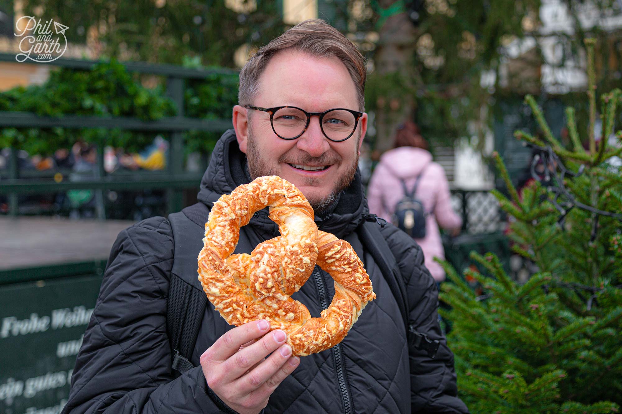 Garth and his giant cheese pretzel at a Vienna Christmas Market