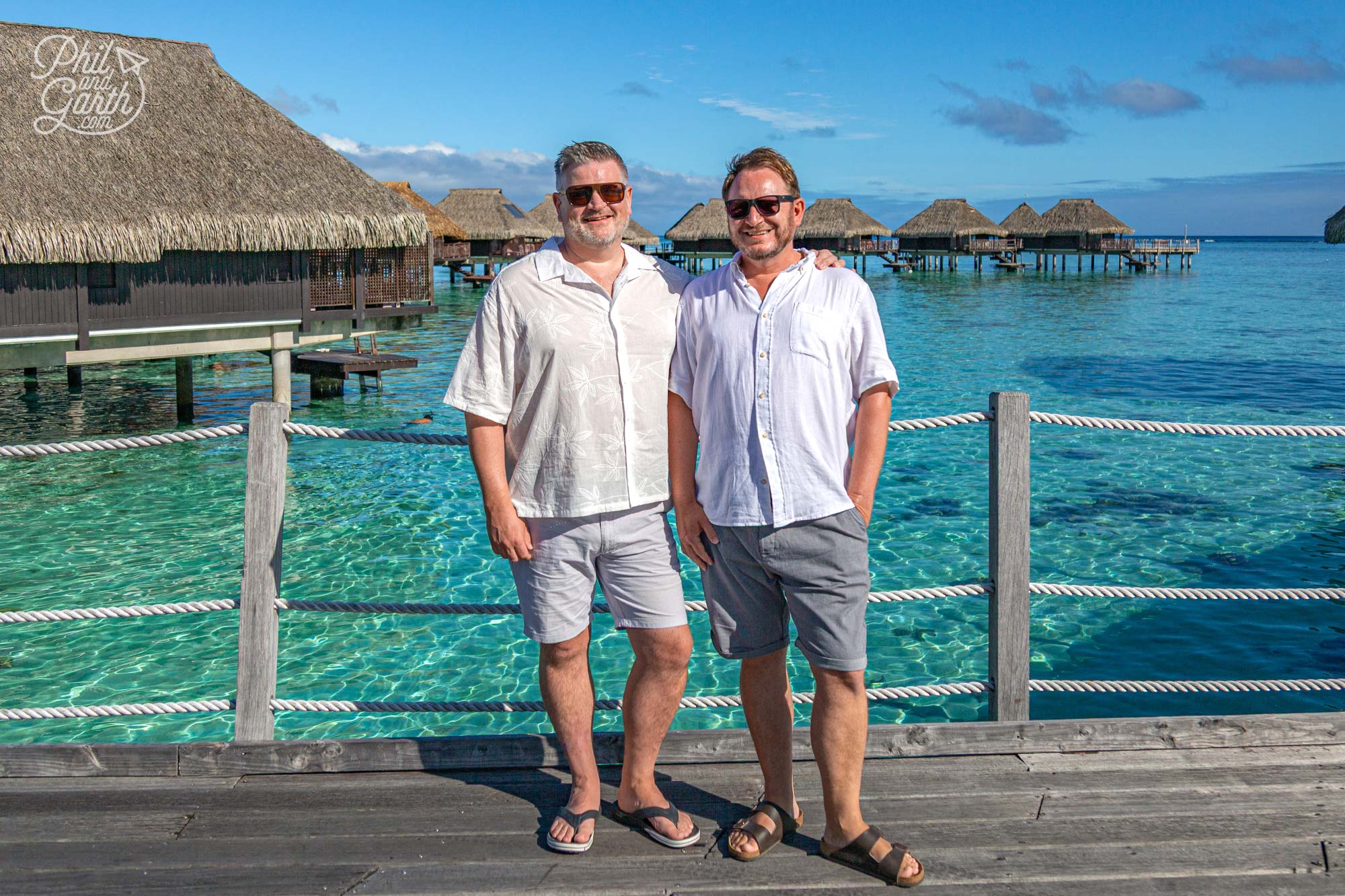 Posing by the overwater bungalows which are stunning
