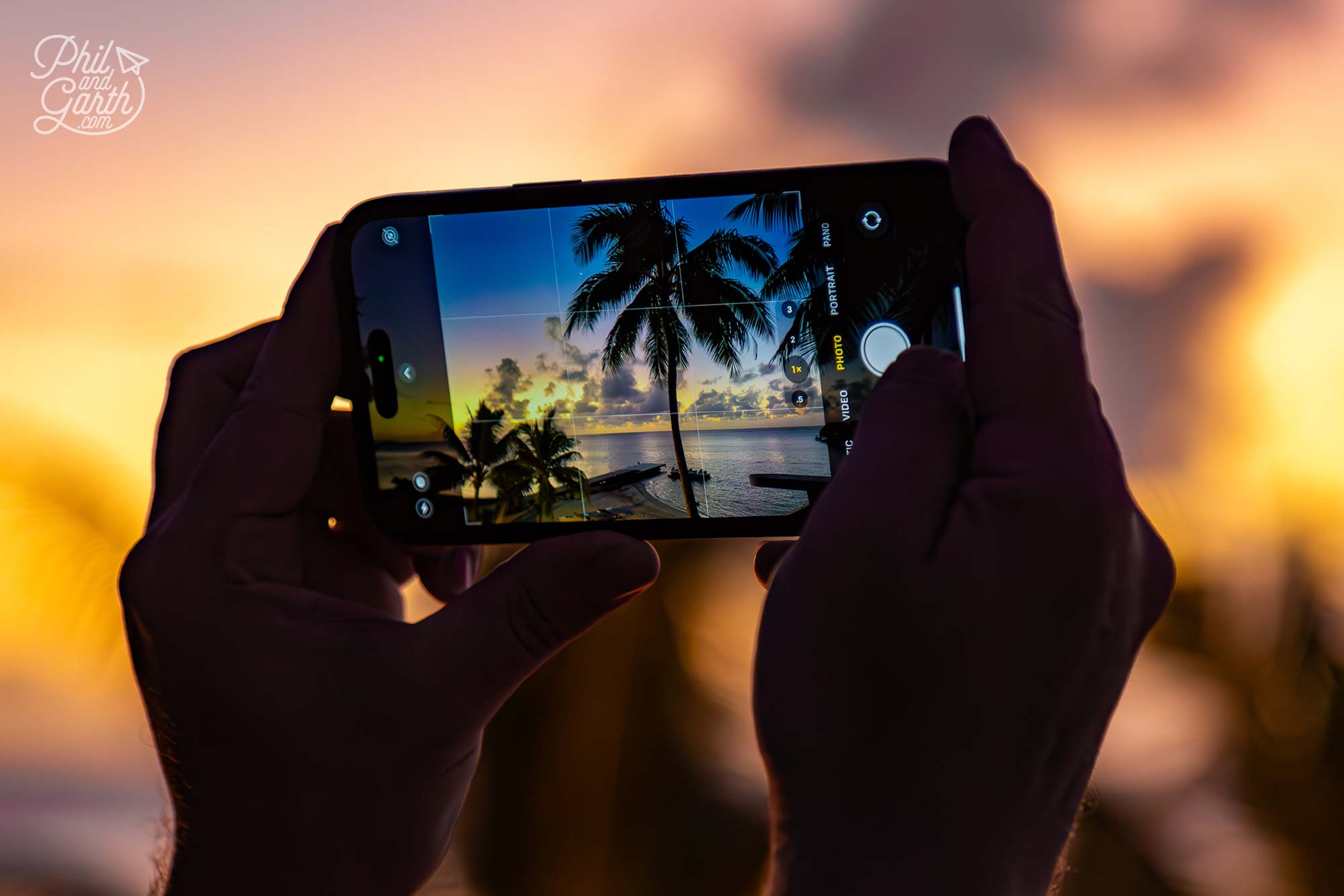 Recording the sunset at the Eimeo Bar