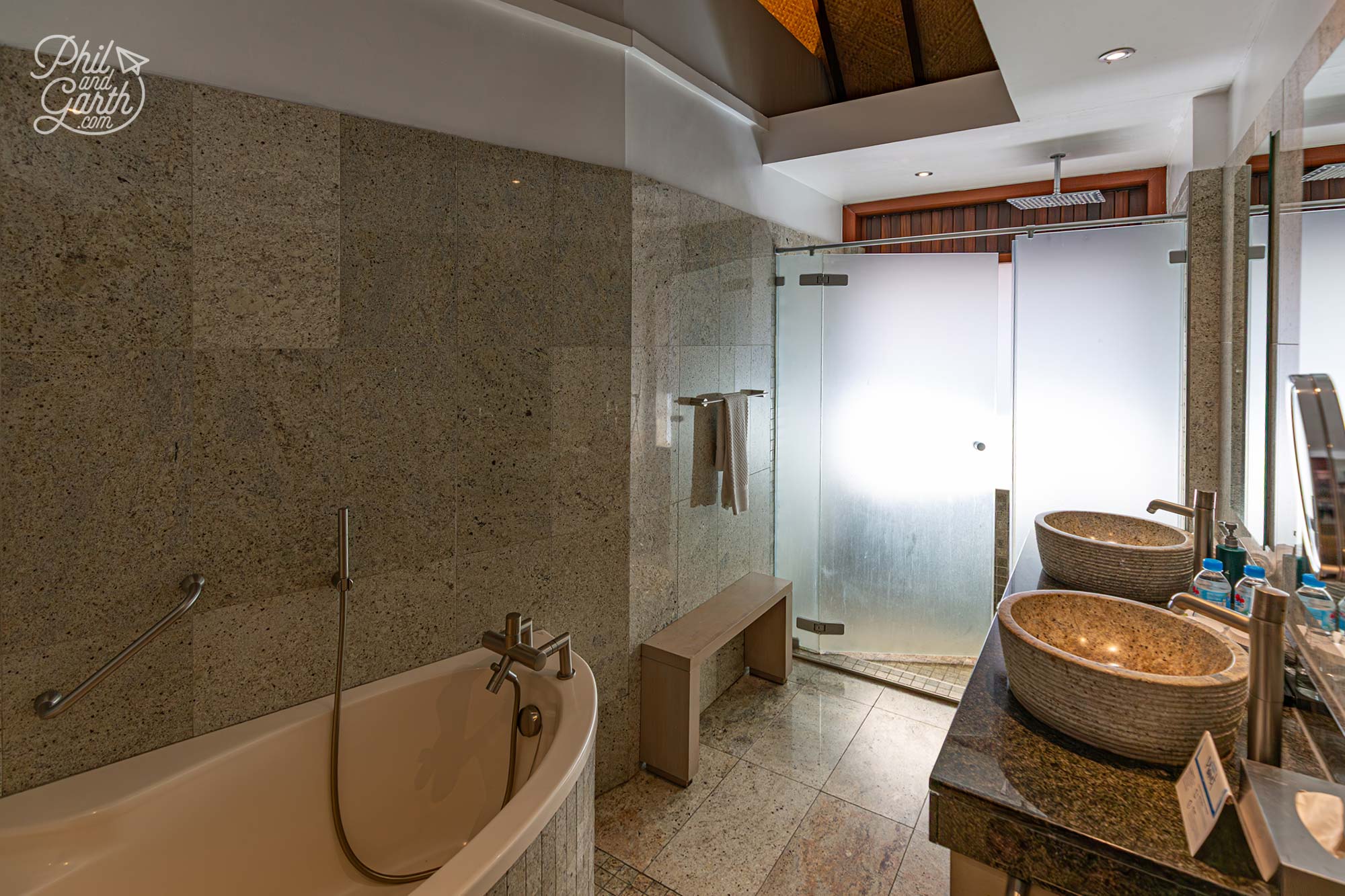 The bathroom a little tired, but has a nice separate power shower