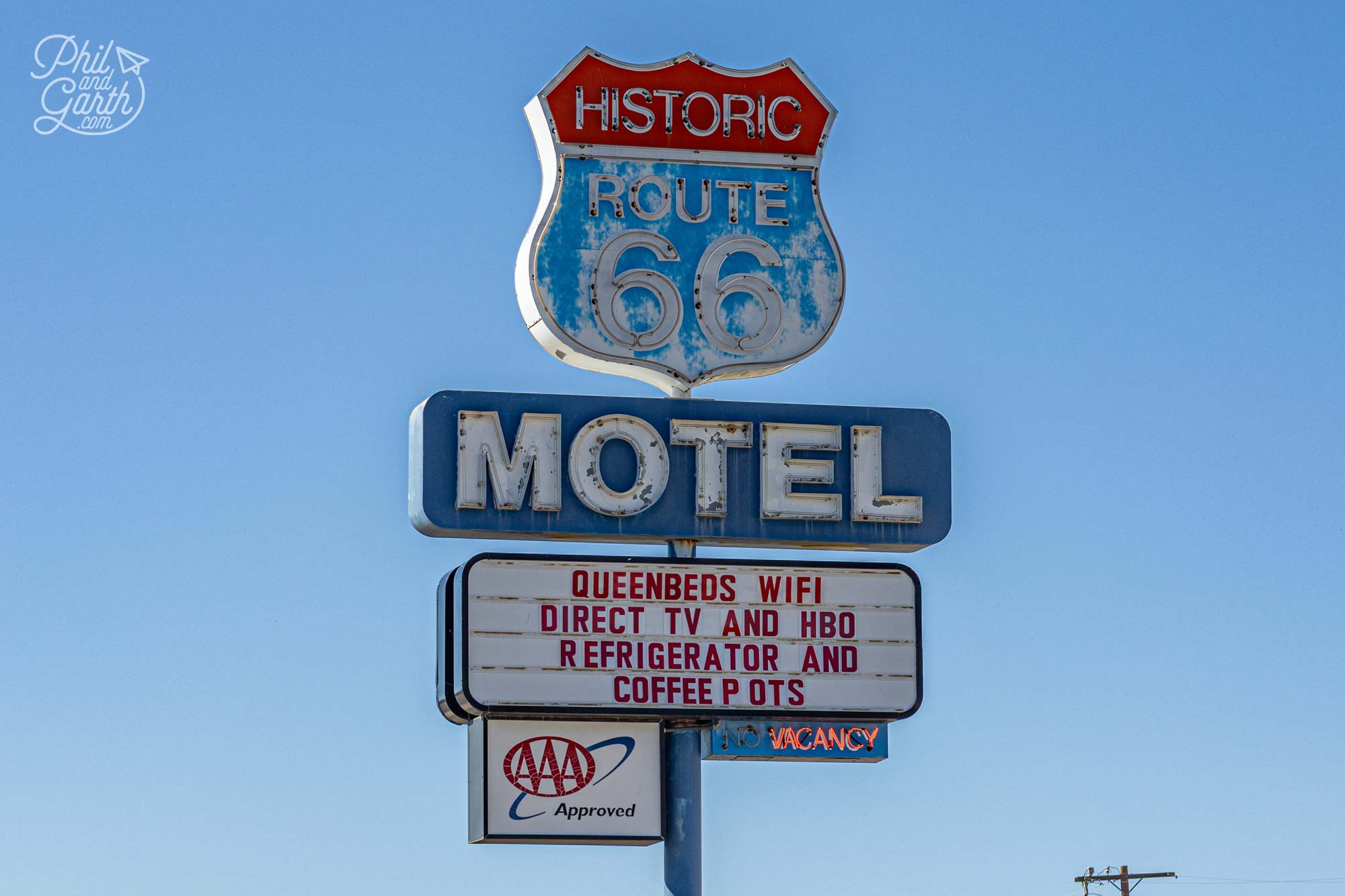 Driving out of Seligman and a vintage neon motel sign