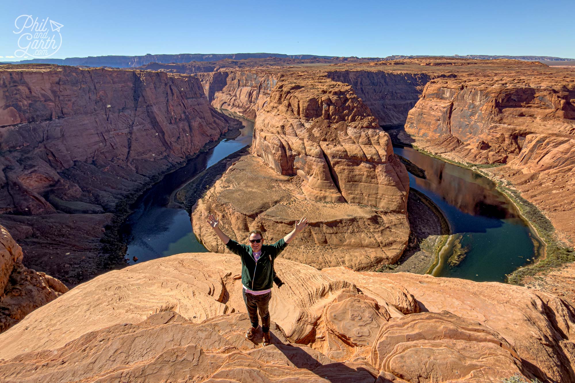 Garth stood a safer distance on one of the rocky edges
