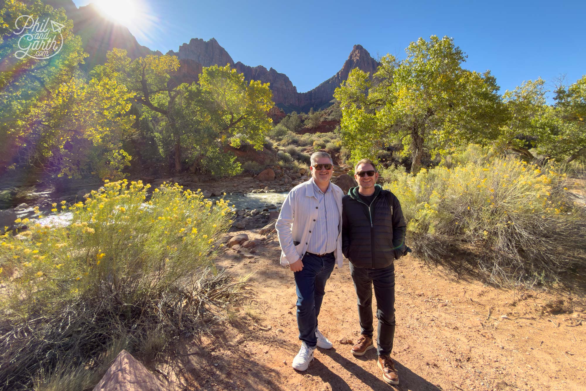 Phil and Garth stood next to the Virgin River that runs through Zion National Park