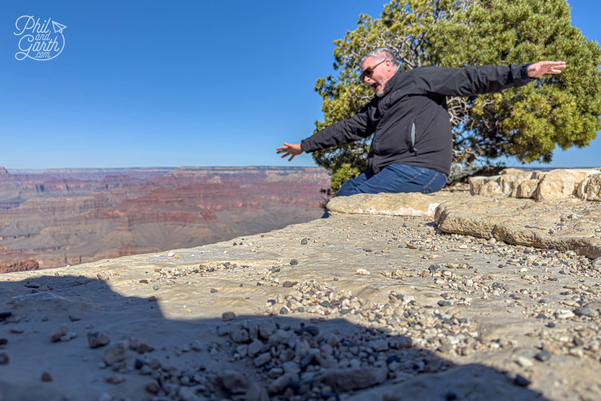 Ken taking a pic of Phil pretending to fall over the edge of the Grand Canyon