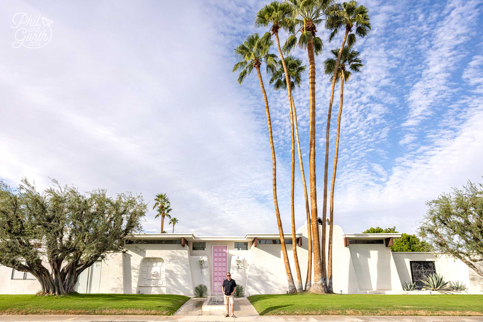 Garth next to the famous pink door of Palm Spring photo spot