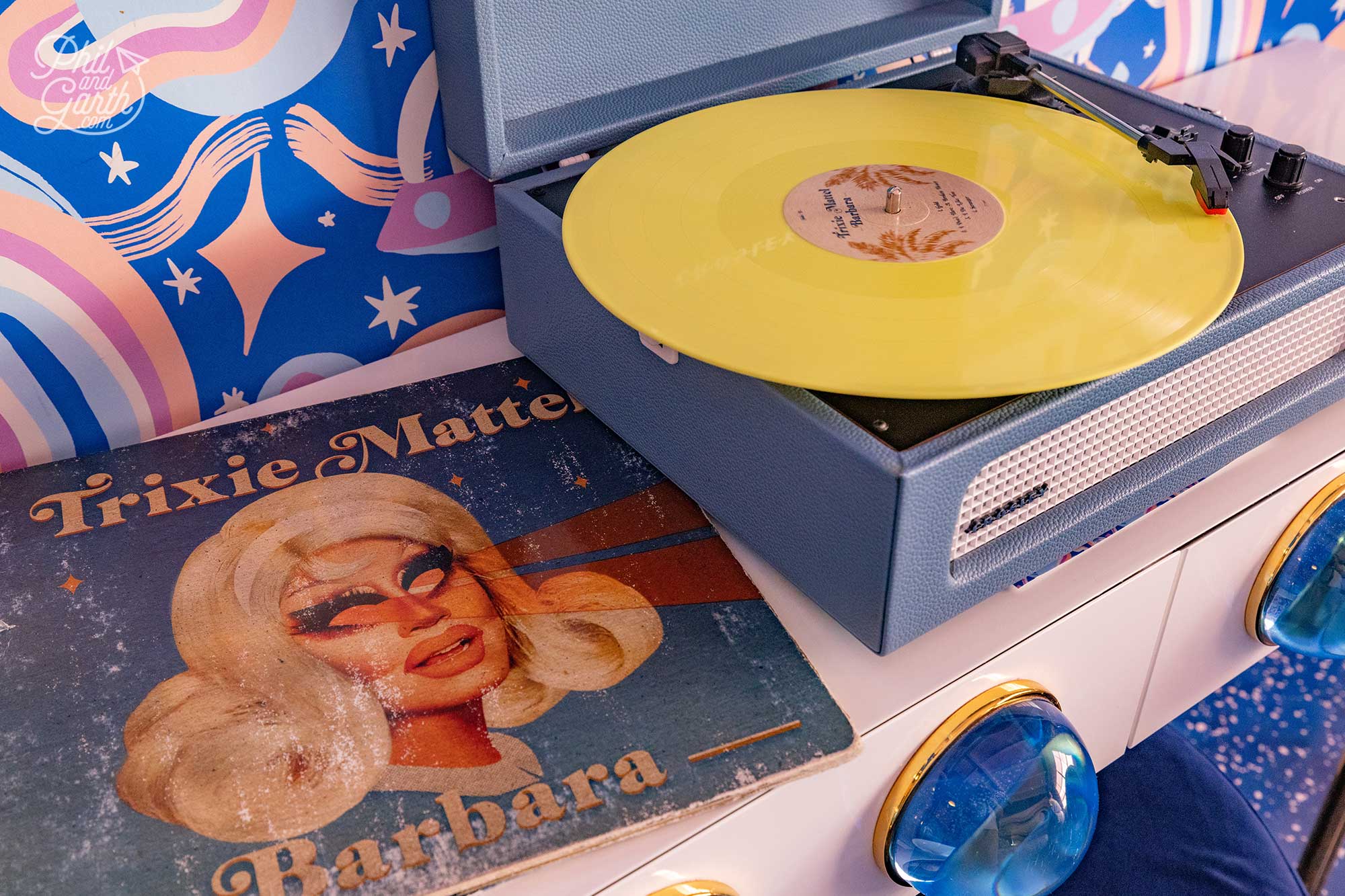 Putting on a vinyl record while getting ready for dinner