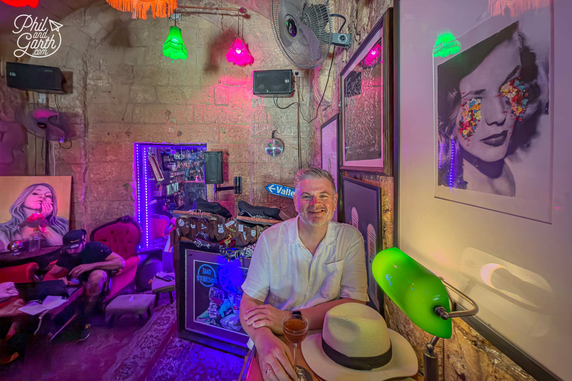 Phil enjoying his cocktail in the cool interior