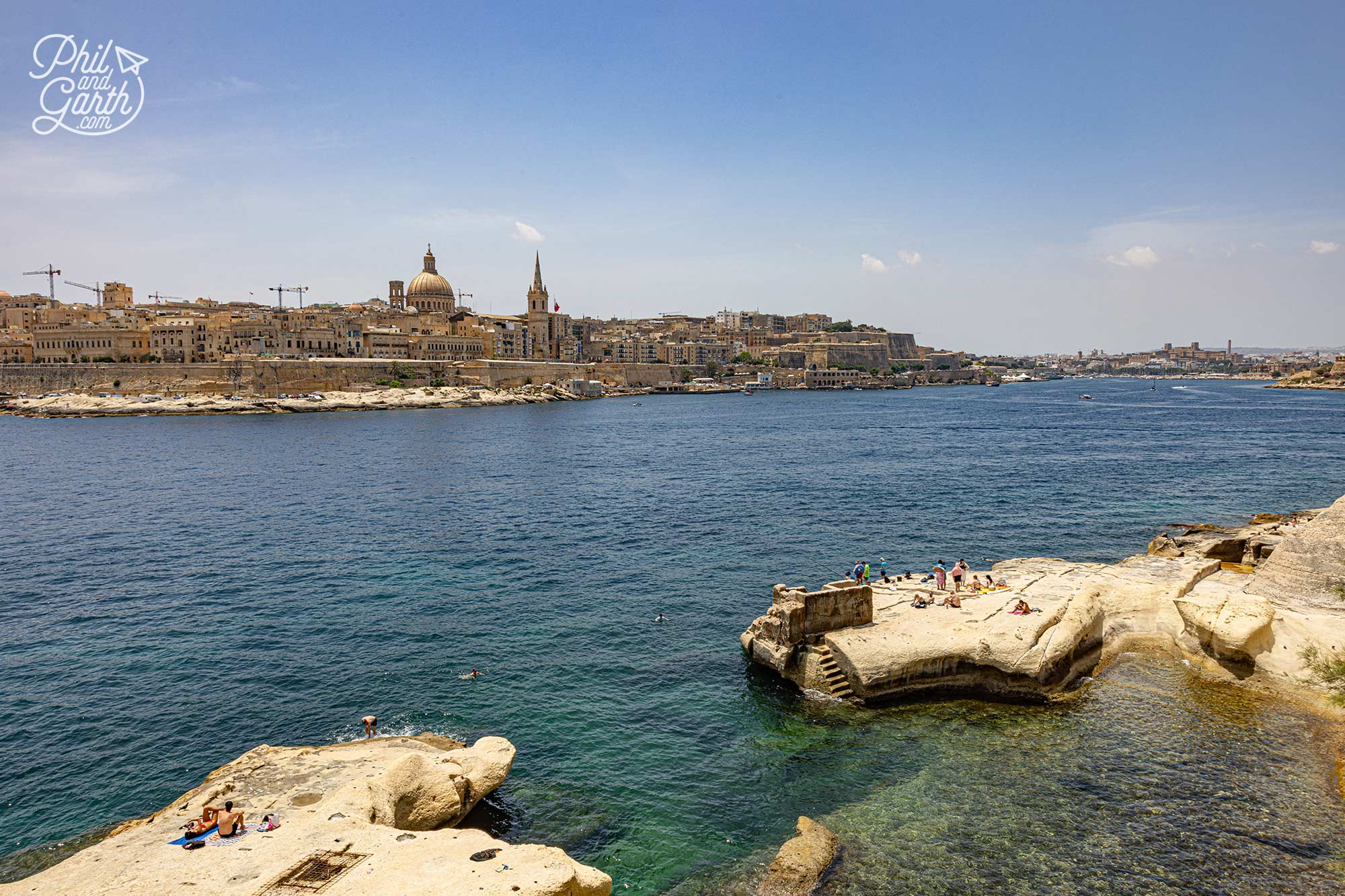 Sliema's rocky shoreline offers the perfect place to relax, swim and soak up panoramic views across Marsamxett Harbour towards Valletta