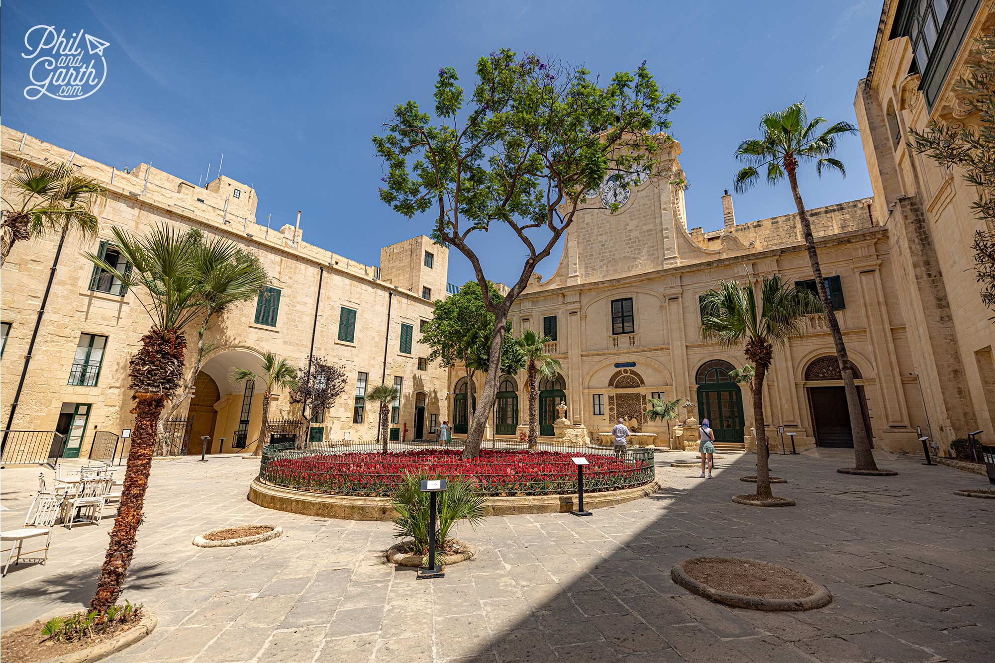 Step inside and you'll discover peaceful courtyards filled with palm trees, fountains and beautifully preserved architecture