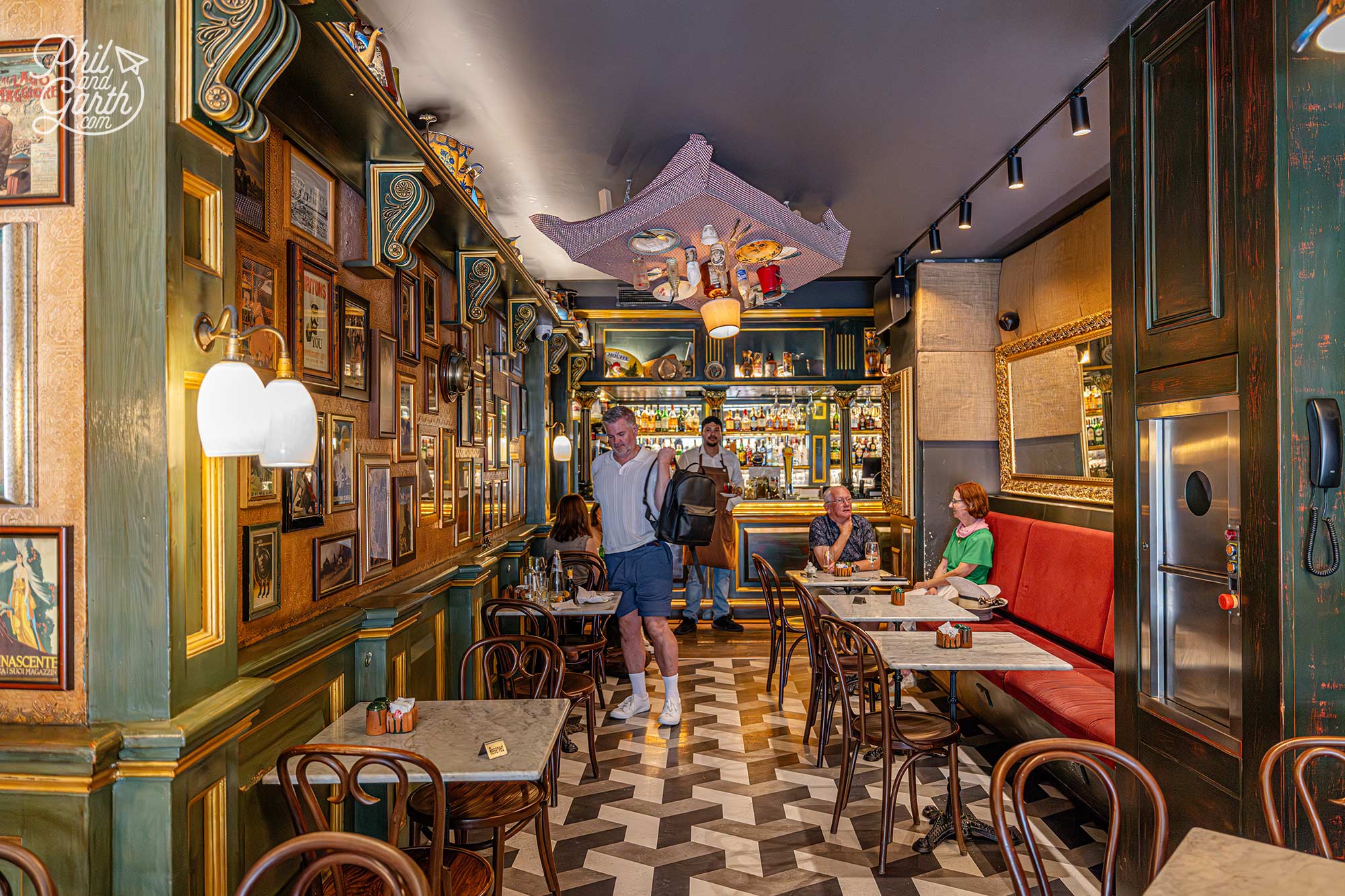 An upside down table floating above the restaurant adds a touch of Maltese eccentricity